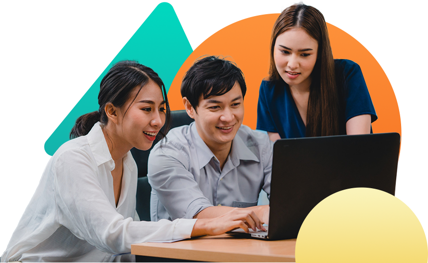 Three professionals working together on branding projects at a leading branding agency in Singapore.